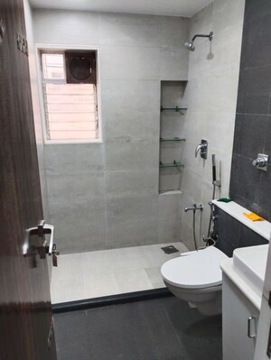 Bathroom in 3 BHK Apartment at Evershine Grandeur, Malad West – for Rent