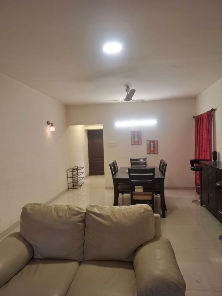 Living Room, gera-emerald-city 2 Bedroom 1200 Sq.Ft. Apartment In Kharadi Pune 10544489