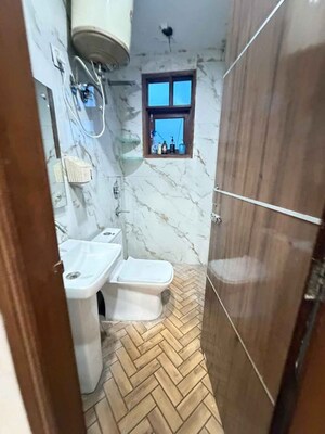 Bathroom in 2 BHK Apartment at Chattarpur – for Rent
