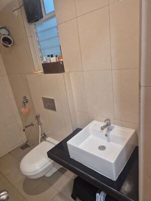 Bathroom in 2 BHK Apartment at Dosti West County, Balkum Pada – for Rent