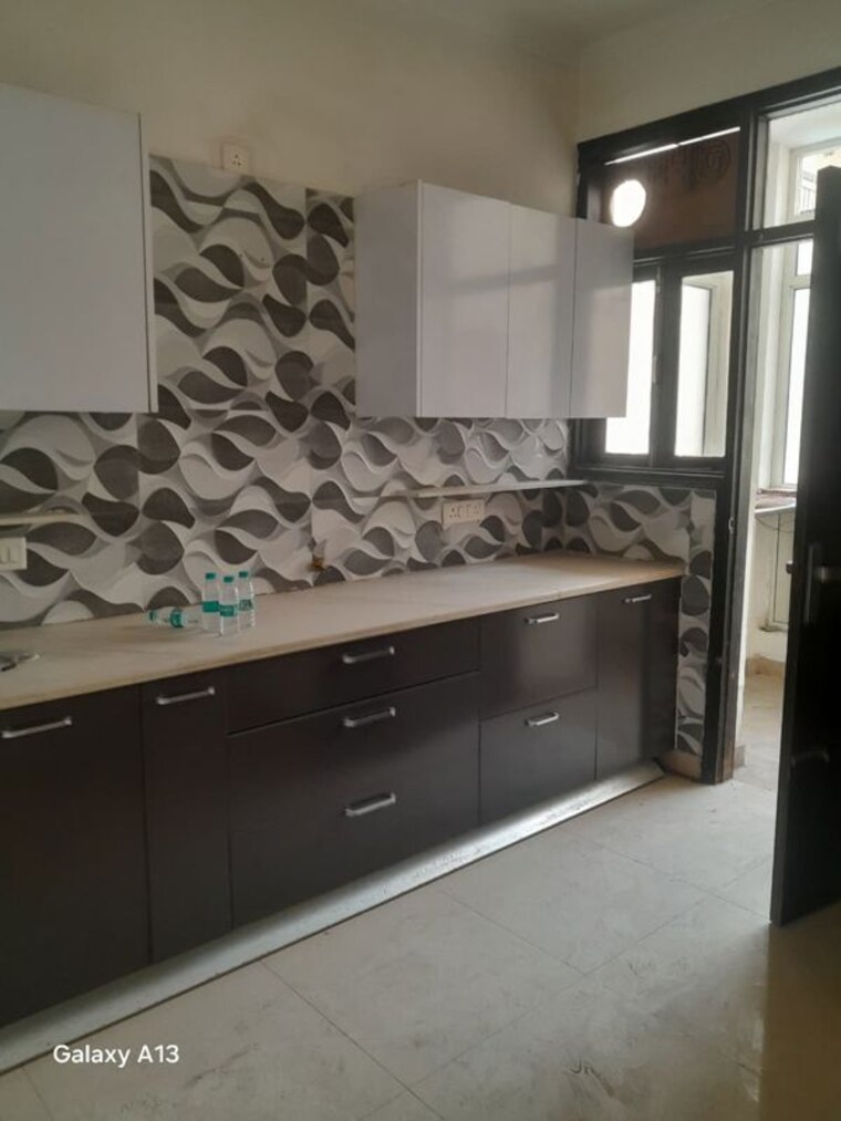 Kitchen, altura-apartments 3 Bedroom 1907 Sq.Ft. Apartment In Ghazipur Zirakpur 10544916