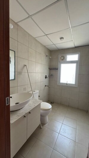 Bathroom in 3.5 BHK Apartment at Bhartiya Nikoo Homes, Thanisandra Main Road – for Rent