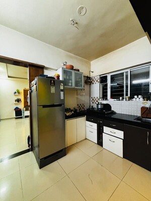 Kitchen in 2 BHK Apartment at Springfield Apartment Ambegaon , Ambegaon Budruk – for Rent