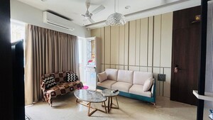 Living Room in 2 BHK Apartment at Omkar Alta Monte, Malad East – for Rent