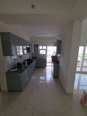 Kitchen in 2 BHK Apartment at Amrapali Centurian Park Phase II, Tech Zone 4 Greater Noida – for Rent
