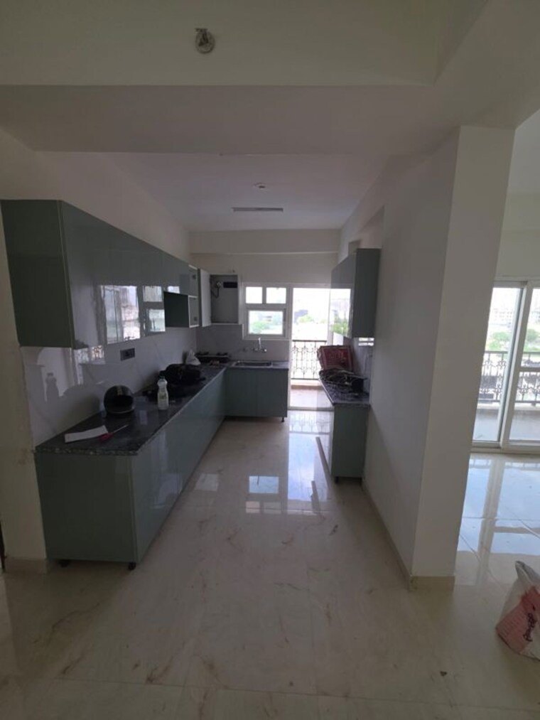 Kitchen, amrapali-centurian-park-phase-ii 2 Bedroom 1095 Sq.Ft. Apartment In Tech Zone 4 Greater Noida Greater Noida 10545292