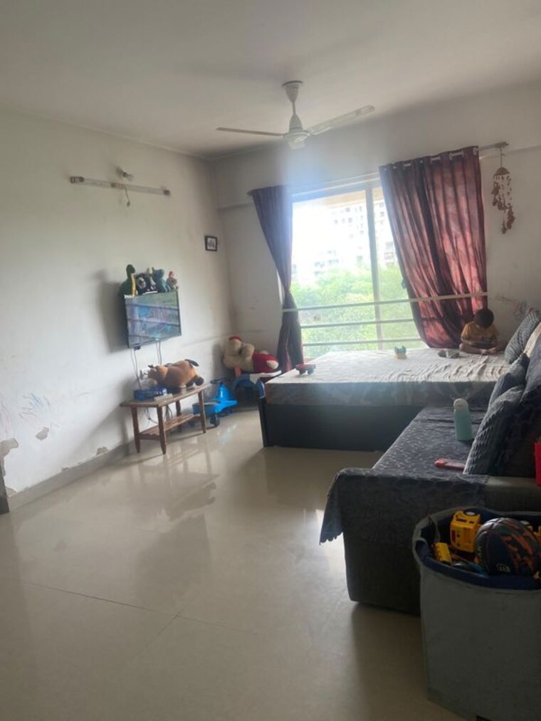 Living Room, karia-konark-orchid 1 Bedroom 890 Sq.Ft. Apartment In Wagholi Pune 10545304
