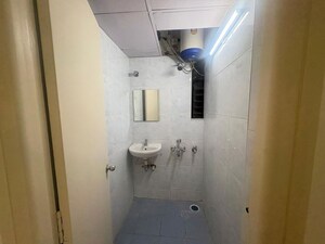 Bathroom in 3 BHK Apartment at Renaissance Park 2, Malleswaram – for Rent