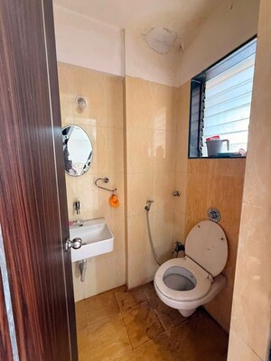 Bathroom in 3 BHK Apartment at Kalpataru Hills, Manpada – for Rent