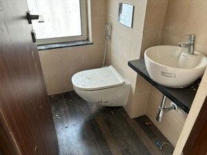 Bathroom in 1 BHK Apartment at Omkar Signet, Malad East – for Rent