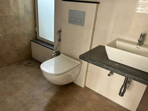 Bathroom in 1 BHK Apartment at Omkar Signet, Malad East – for Rent