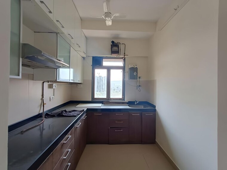 Kitchen, lodha-casa-royale 3 Bedroom 1100 Sq.Ft. Apartment In Balkum Pada Thane 10545416