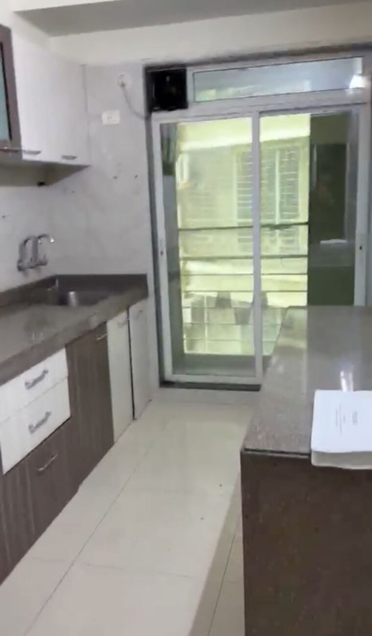 Kitchen, skd-pinnacolo 3 Bedroom 820 Sq.Ft. Apartment In Mira Road Thane 10545446