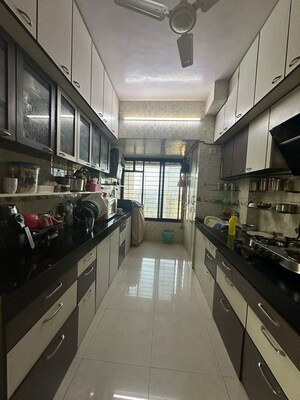 Kitchen in 2 BHK Apartment at Maharaja Retreat CHS, Goregaon East – for Rent