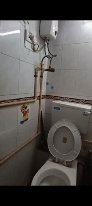 Bathroom in 1 BHK Apartment at Parle Pushpa CHS, Vile Parle East – for Rent