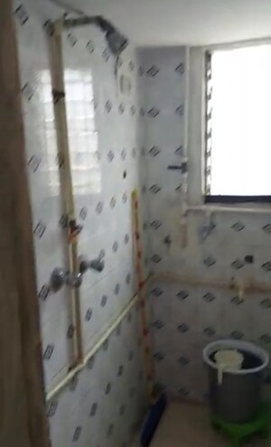 Bathroom in 1 BHK Apartment at Unique Siddharth CHS, Mira Road – for Sale