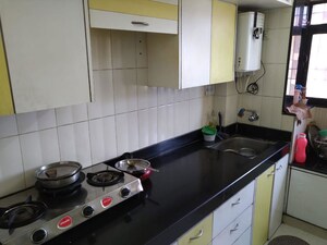 Kitchen in 2 BHK Apartment at Squarefeet Grand Square, Anand Nagar – for Rent