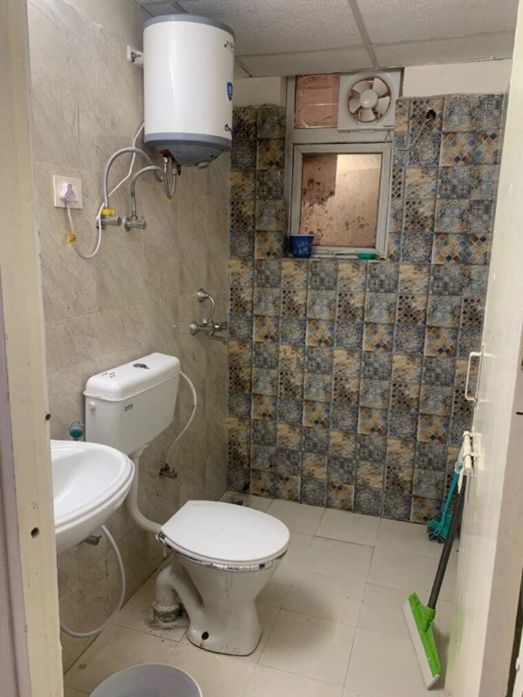 Bathroom, signature-the-millennia-3 2 Bedroom 688 Sq.Ft. Apartment In Sector 37d Gurgaon 10545562