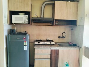Kitchen in Studio Apartment at Supertech Ecociti, Sector 137 – for Rent