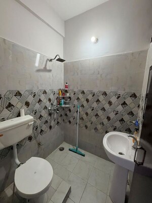 Bathroom in 3 BHK Builder Floor at Guru Nanak Enclave, Dhakoli – for Rent