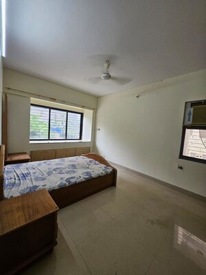 Bedroom in 2 BHK Apartment at Lalani Grandeur, Goregaon East – for Rent