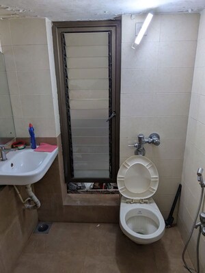 Bathroom in 3 BHK Apartment at Marathon Galaxy, Mulund West – for Rent