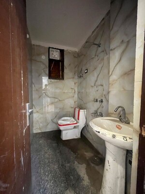 Bathroom in 2 BHK Builder Floor at Chattarpur – for Rent