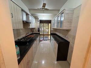 Kitchen in 2 BHK Apartment at Sudarshan Sky Garden, Ghodbunder Road – for Rent