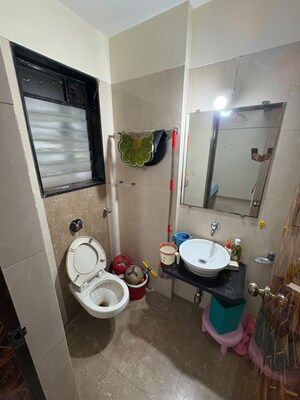 Bathroom in 2 BHK Apartment at Sudarshan Sky Garden, Ghodbunder Road – for Rent