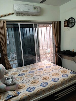 Master Bedroom in 2 BHK Apartment at Shraddha Esquire Skytower, Mulund West – for Sale