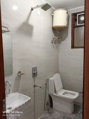 Bathroom in 2 BHK Apartment at Khirki Extension – for Rent