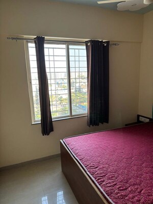 Room in 2 BHK Apartment at Pride Aashiyana, Dhanori – for Rent