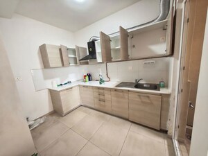 Kitchen in 2 BHK Apartment at Bhartiya Nikoo Homes Phase 2, Thanisandra Main Road – for Rent