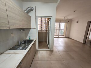 Kitchen in 2 BHK Apartment at Bhartiya Nikoo Homes Phase 2, Thanisandra Main Road – for Rent
