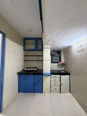 Kitchen in 2.5 BHK Apartment at Acme Oasis, Kandivali East – for Rent