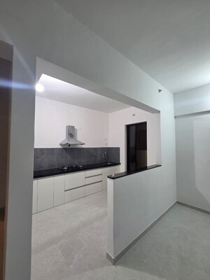 Kitchen in 2 BHK Apartment at Pride World City, Charholi Budruk – for Sale