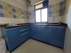 Kitchen in 1 BHK Apartment at Raunak Heights, Ghodbunder Road – for Rent