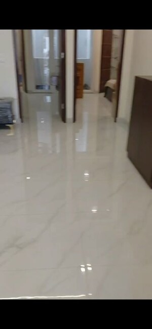 Building Lobby in 3 BHK Apartment at US Pine Homes, Dhakoli – for Rent