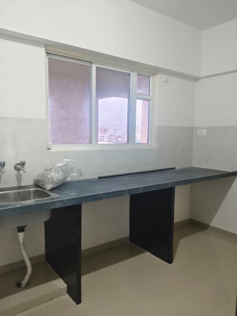Kitchen, nyati-era 1 Bedroom 400 Sq.Ft. Apartment In Dhanori Pune 10546525