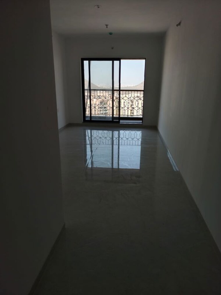 Hall, pride-world-city 2.5 Bedroom 950 Sq.Ft. Apartment In Charholi Budruk Pune 10546563