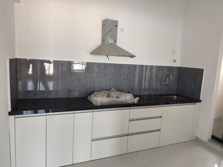Kitchen, pride-world-city 2.5 Bedroom 950 Sq.Ft. Apartment In Charholi Budruk Pune 10546563