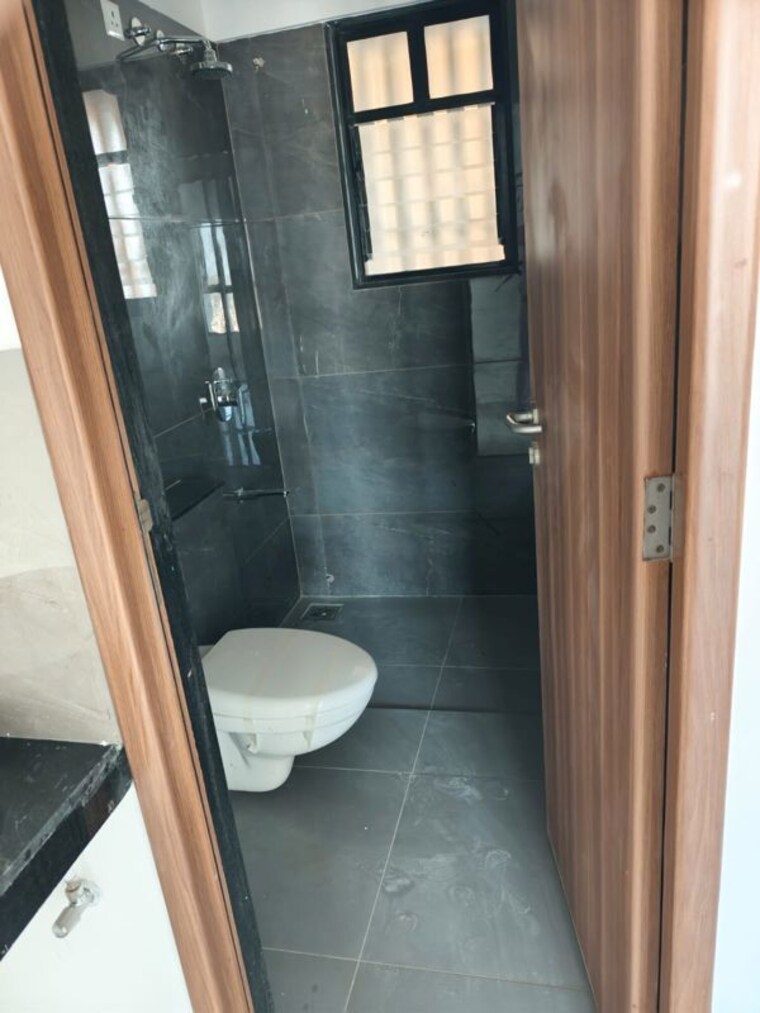 Bathroom, pride-world-city 2.5 Bedroom 950 Sq.Ft. Apartment In Charholi Budruk Pune 10546563