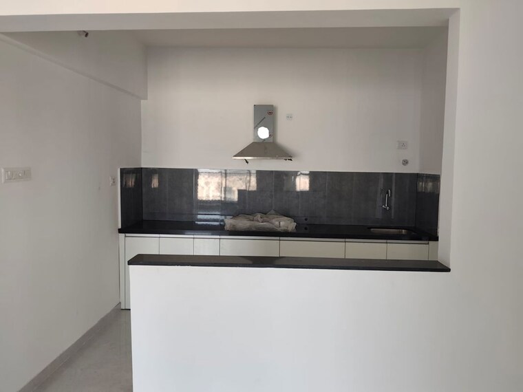 Kitchen, pride-world-city 2 Bedroom 780 Sq.Ft. Apartment In Charholi Budruk Pune 10546565