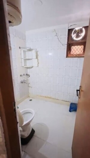 Bathroom in 3 BHK Builder Floor at Khirki Extension – for Sale