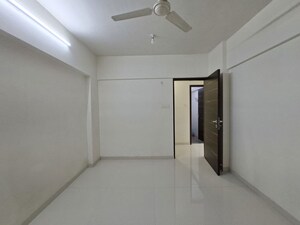 Bedroom in 2 BHK Apartment at Romell Shraddha, Borivali West – for Sale
