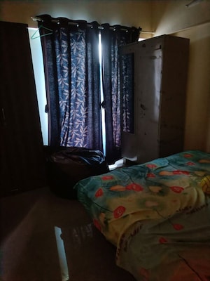 Bedroom in 2 BHK Apartment at Rachana Belvedere Apartment, Aundh – for Rent