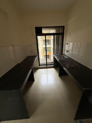 Building Lobby in 2 BHK Apartment at Shree Ganesh Dham CHS, New Panvel – for Rent