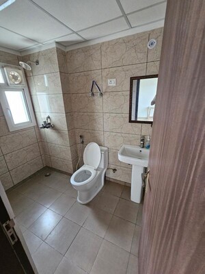 Bathroom in 2.5 BHK Apartment at Gulshan Botnia, Sector 144 – for Sale