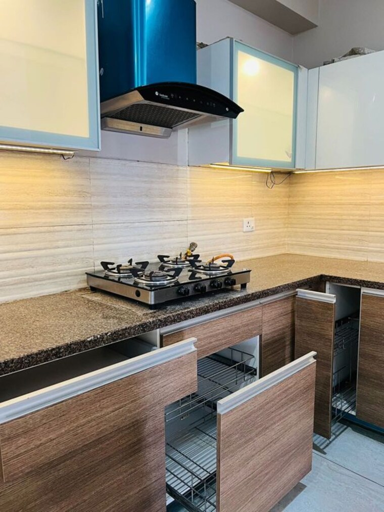 Kitchen, aba-cleo-county 3 Bedroom 1627 Sq.Ft. Apartment In Sector 121 Noida 10546756