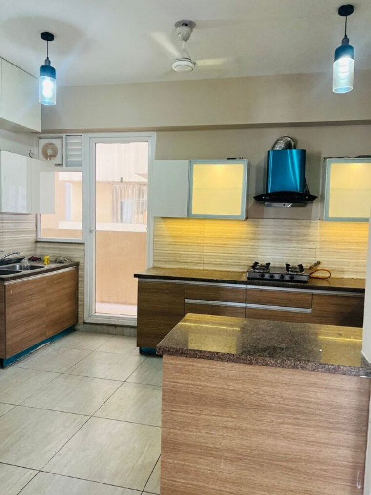 Kitchen, aba-cleo-county 3 Bedroom 1627 Sq.Ft. Apartment In Sector 121 Noida 10546756